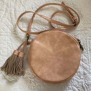 Blush pink round Anthropologie cross body bag!